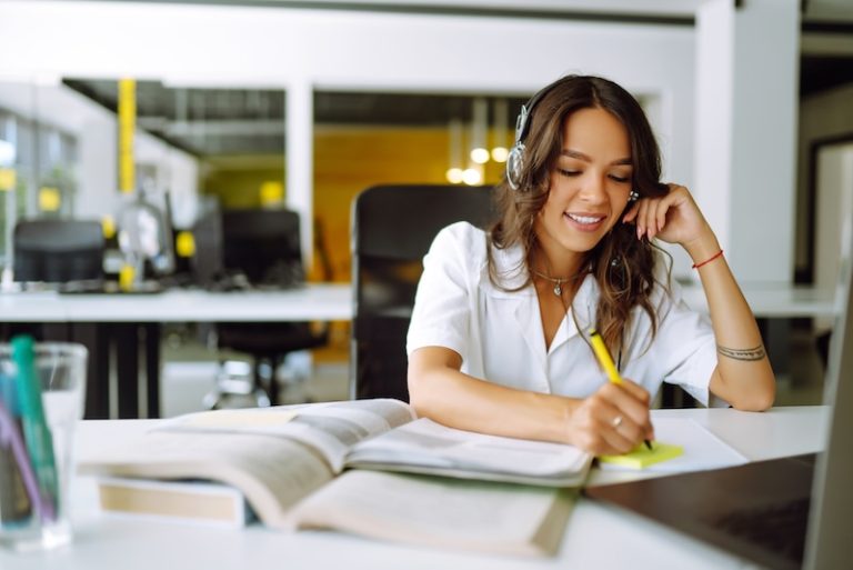 Distance learning. Young business woman, student, teacher. E-learning education concept